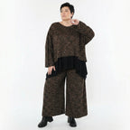 Marlenehose aus warmem Jacquard in Schwarz Cognac Orange mit weitem Bein und Taschen