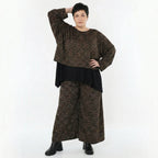 Marlenehose aus warmem Jacquard in Schwarz Cognac Orange mit weitem Bein und Taschen
