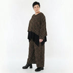 Jacquard Überwurf in schwarzcognacorange mit Kringelmuster oversized Rundhals Langarm