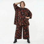 Jacquardjacke in Schwarz Rot Weiss mit Stehkragen boxigem Schnitt und Seitennahttaschen