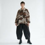 Bluse in A-Form mit schwarzbraunweißem Reptilprint aus Slinkymaterial Kragen Taschen