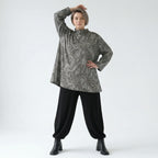 Rollkragenshirt in grauschwarzweißem Vichystreifenmuster Glockenform fein gestrickt weich