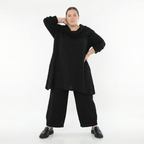 Schwarze Ballonhose aus Feinstrick mit Ajourmuster Streifen und Wellen weich elastisch