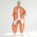 Stilvolle Lagenlook Bluse aus weich fließender Popeline mit schimmernder Oberfläche und Batikmuster, Orange/Weiß