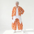 Ausgefallene Ballon Hose im legeren Lagenlook mit luftig leichter Popeline und Batik Muster, Orange/Weiß