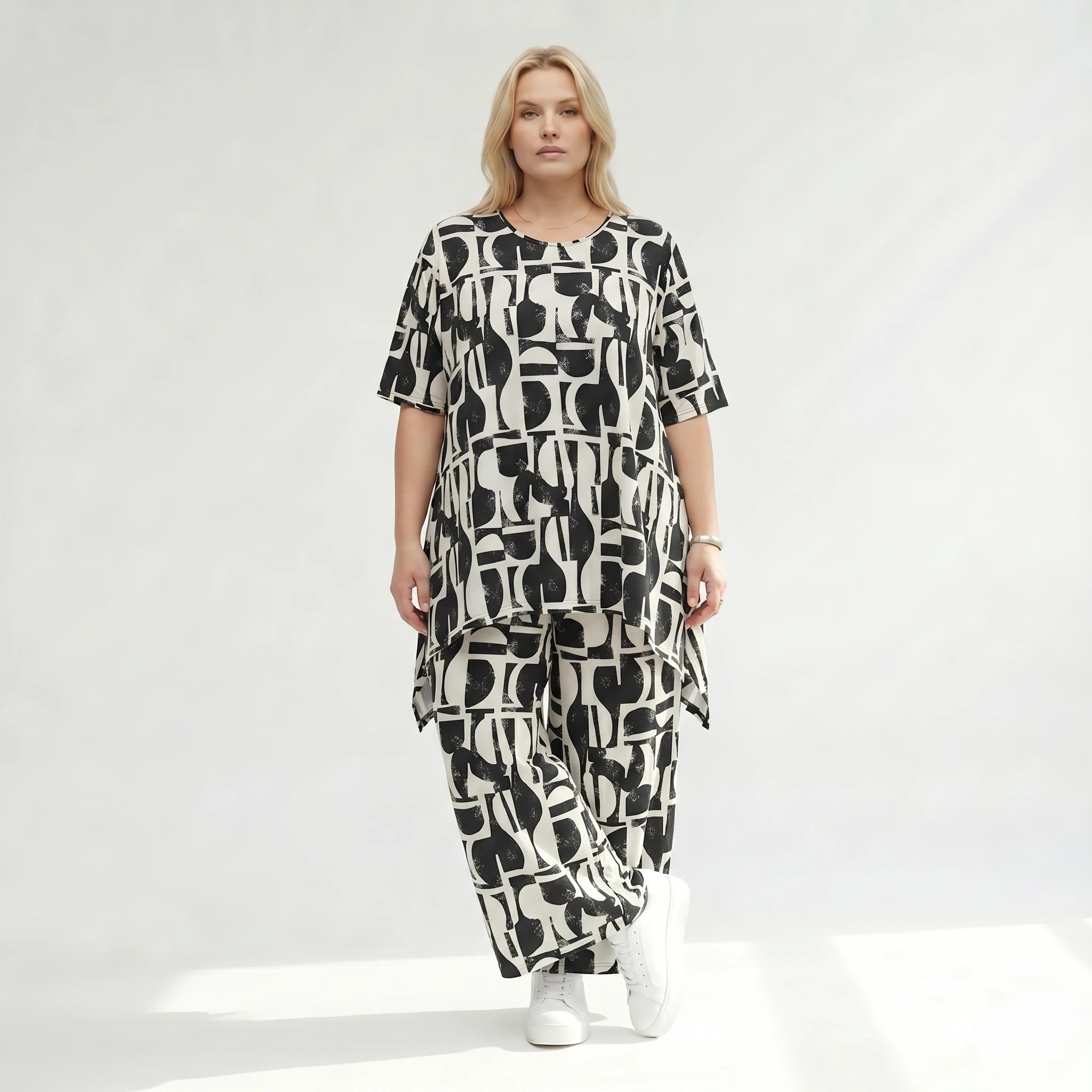 Zeitlose Palazzo Hose im ausgefallenen Lagenlook mit weich fließendem Stretch und abstraktem Muster, Schwarz/Weiß