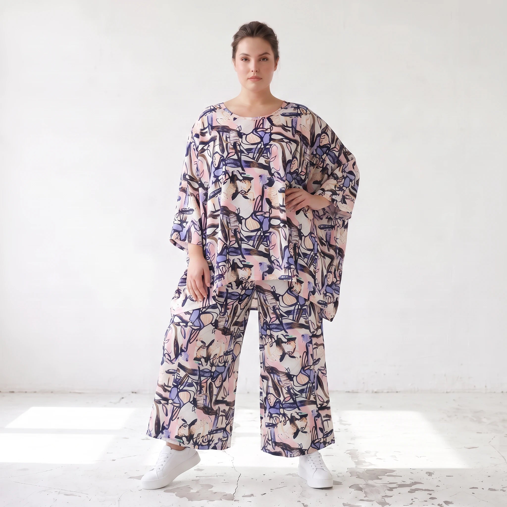 Oversized Shirt aus leichter Viskose Popeline in zartem Rosa mit asymmetrischem Schnitt