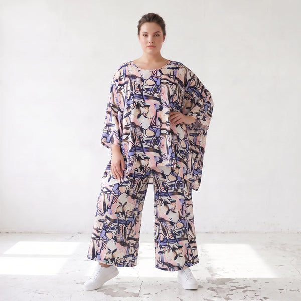 Oversized Shirt aus leichter Viskose Popeline in zartem Rosa mit asymmetrischem Schnitt