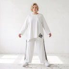 Weiches Langarmshirt in Weiß aus French Terry mit Grafikprint und lockerer A-Linie