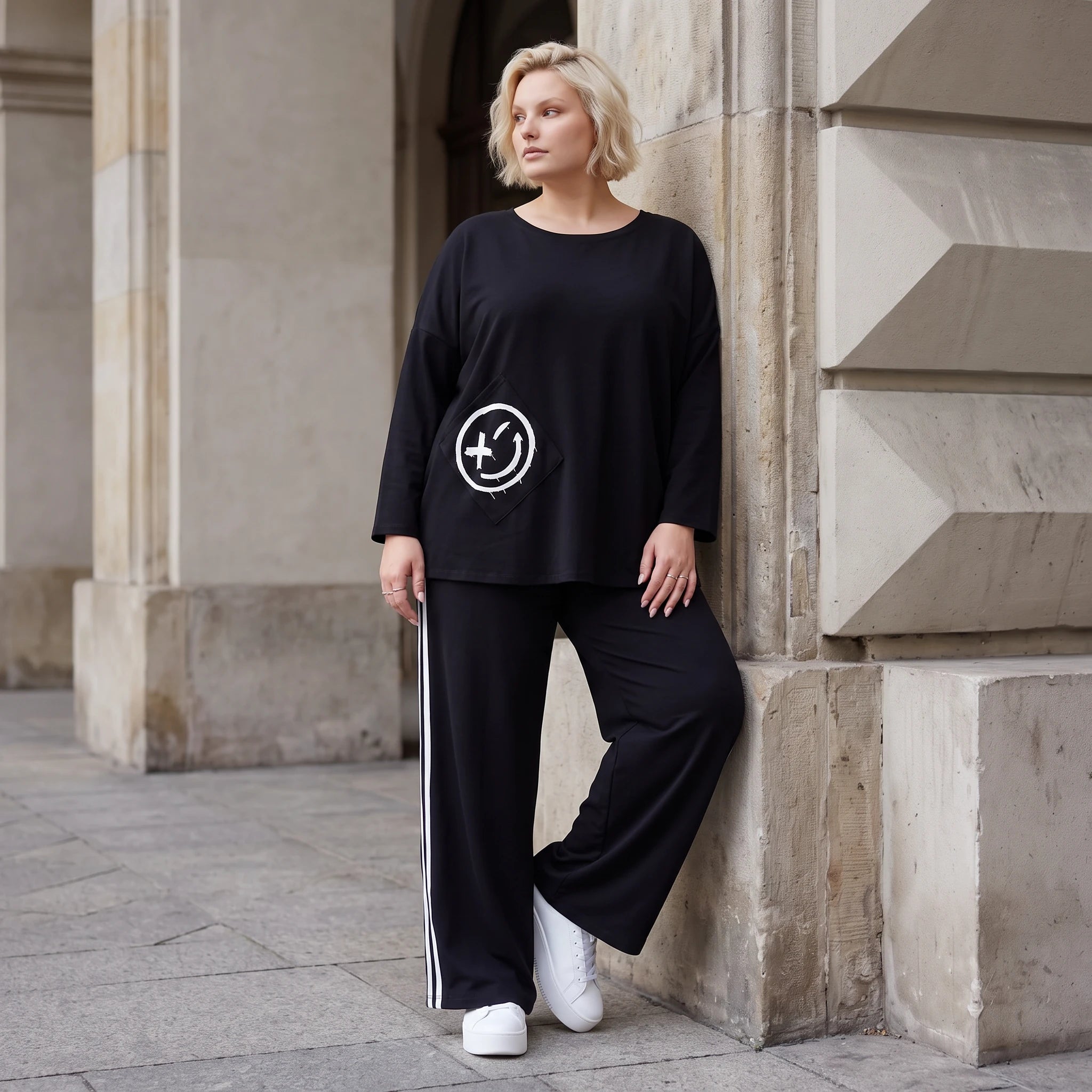Sweatshirt mit Smileyprint und asymmetrischer Tasche aus weichem French Terry Rundhals