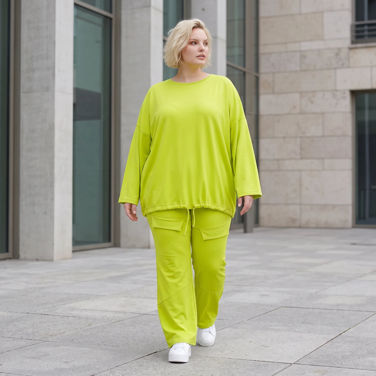 Limettengrünes Langarmshirt in Travellerqualität mit kastigem Schnitt und Tunnelzugsaum