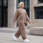 Taupe Ballonhose aus weichem French Terry mit Smileymuster Biesennähten und Dehnbund