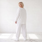 Oversizehose aus warmem French Terry mit Smileyprint gesmoktem Saum und Seitentaschen
