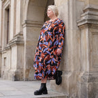 Weiches Romanitjerseykleid in Schwarz/Orange mit Ballonform Langarm Rundhalsausschnitt