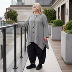 Bengalinebluse in Schwarz/Weiß A-Linie mit Rundhalsausschnitt Taschen und Zipfelsaum