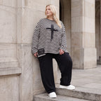 A-Linie Langarmshirt aus feinem Stretchjersey in Schwarz/Weiß mit seitlichen Schlitzen