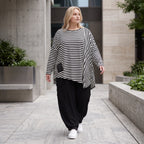 Langarmshirt in Schwarz/Weiß aus weichem Stretchjersey mit asymmetrischem Zipfelsaum