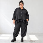 Schwarze Denimballonhose mit Stretch und bequemem Schlupfbund in weiter Passform