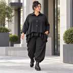 Schwarze Denimballonhose mit Stretch und bequemem Schlupfbund in weiter Passform