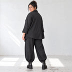 Schwarze Denimballonhose mit Stretch und bequemem Schlupfbund in weiter Passform