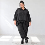 Schwarze Denimballonhose mit Stretch und bequemem Schlupfbund in weiter Passform