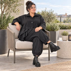 Schwarze Denimballonhose mit Stretch und bequemem Schlupfbund in weiter Passform