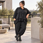 Schwarze Denimballonhose mit Stretch und bequemem Schlupfbund in weiter Passform