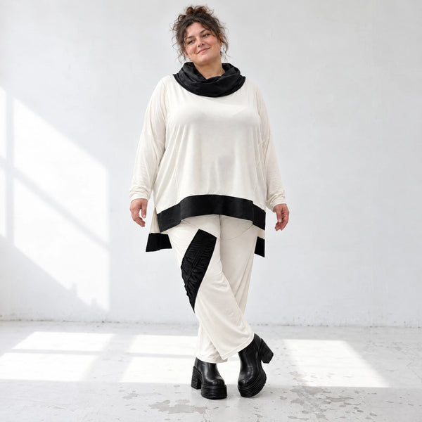 Rollkragenshirt aus fließendem Jersey mit Stretch Vokuhilaform mit seitlichen Schlitzen