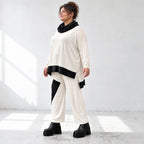 Rollkragenshirt aus fließendem Jersey mit Stretch Vokuhilaform mit seitlichen Schlitzen