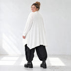 Creme Strickcardigan aus Baumwolle mit Stehkragen Taschen und A-Linie in Glockenform