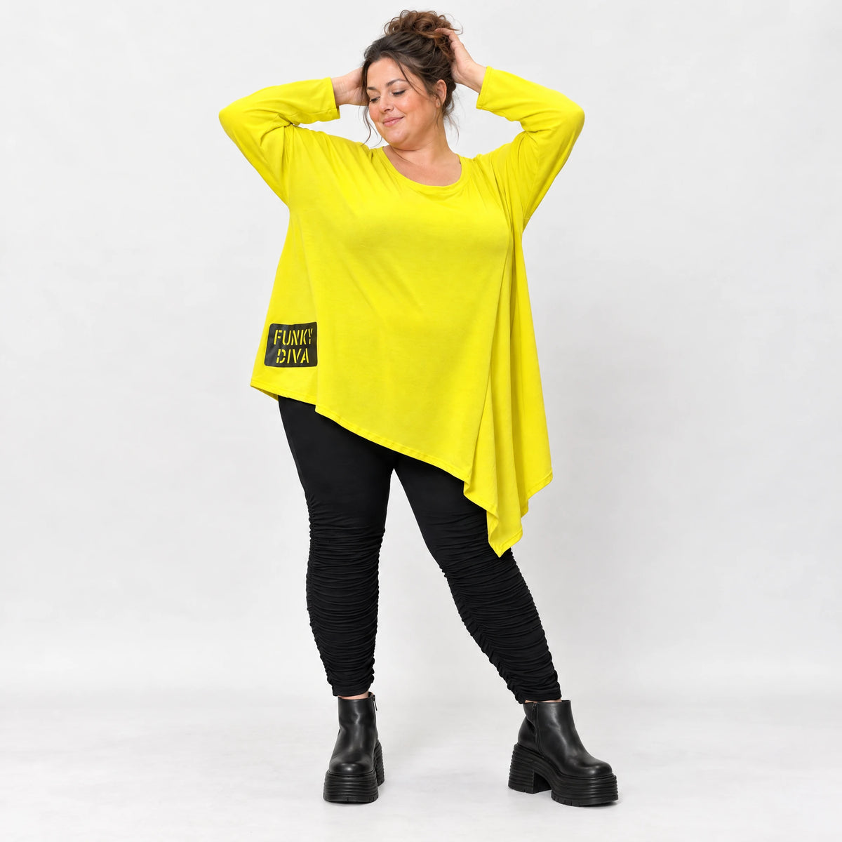 Langarmshirt in sonnigem Gelb aus weichem Stretchjersey mit asymmetrischem Zipfelsaum