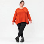 Langarmshirt in Orange mit Rundhalsausschnitt und fließender A-Linie aus Stretchjersey