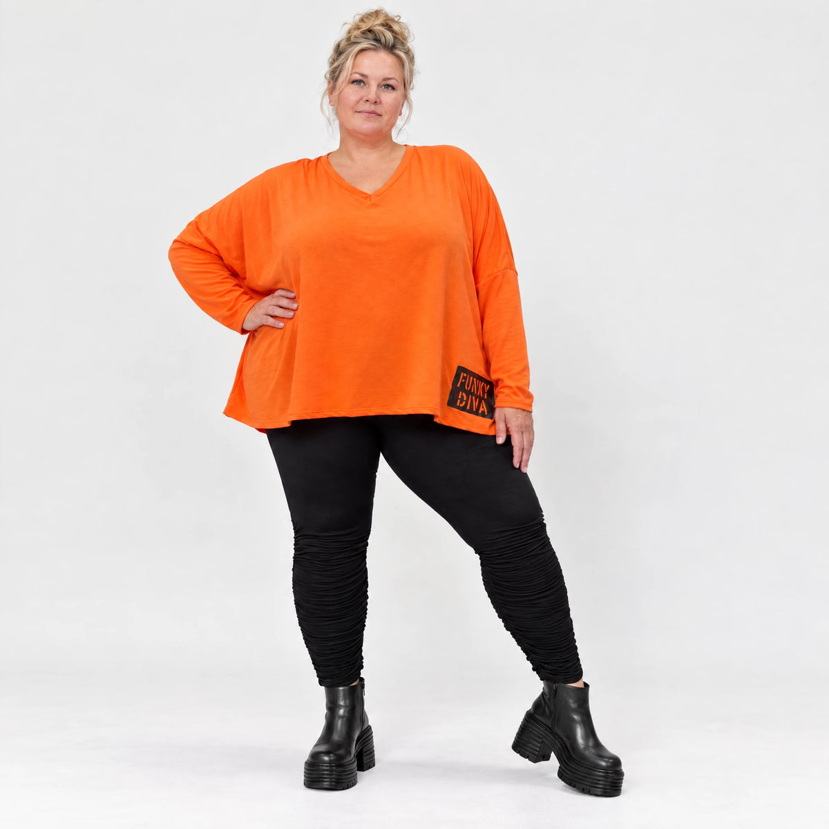 Langarmshirt in kräftigem Orange mit lässig kastigem Schnitt aus weichem Baumwolljersey