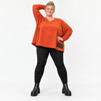 Langarmshirt in Orange aus weichem Stretchjersey mit V-Ausschnitt und kastiger Passform
