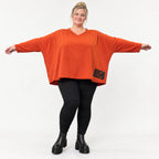 Langarmshirt in Orange aus weichem Stretchjersey mit V-Ausschnitt und kastiger Passform