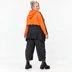 Kapuzenüberwurf in leuchtendem Orange aus feinem Stretchjersey mit Tunnelzug und Vokuhila