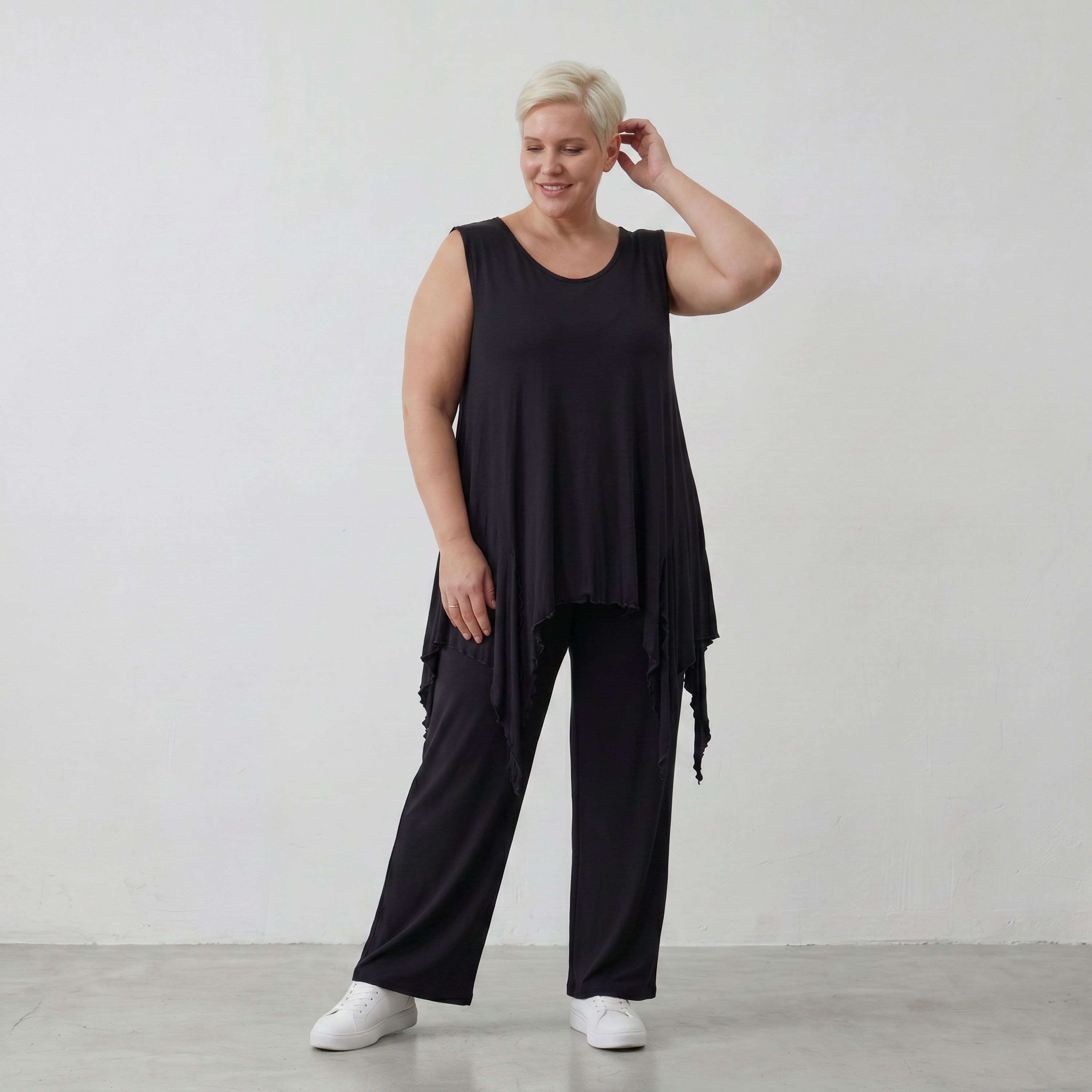 Ärmelloses Zipfeltop aus weichem schwarzem Viskose Stretch Jersey mit Rundhalsausschnitt