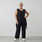 Ärmelloses Zipfeltop aus weichem schwarzem Viskose Stretch Jersey mit Rundhalsausschnitt