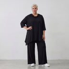 Fließendes Shirt in Schwarz mit Zipfelkapuze und Dreiviertelarm aus weichem Viskosejersey