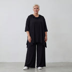 Fließendes Shirt in Schwarz mit Zipfelkapuze und Dreiviertelarm aus weichem Viskosejersey