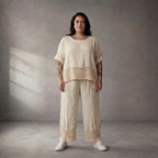 Zeitlose Creme Leinenhose im leger Lagenlook mit Strickdetails und Komfortbund Sommerfit