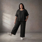 Zeitlose luftige schwarze Leinenhose im Lagenlook mit Strickdetails leger und ausgefallen
