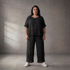 Zeitlose luftige schwarze Leinenhose im Lagenlook mit Strickdetails leger und ausgefallen