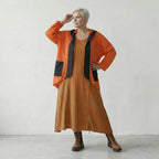 Zeitlos stilvolle Lagenlook Jacke aus feinem Strick mit ausgefallener Loch Struktur, Orange/Schwarz