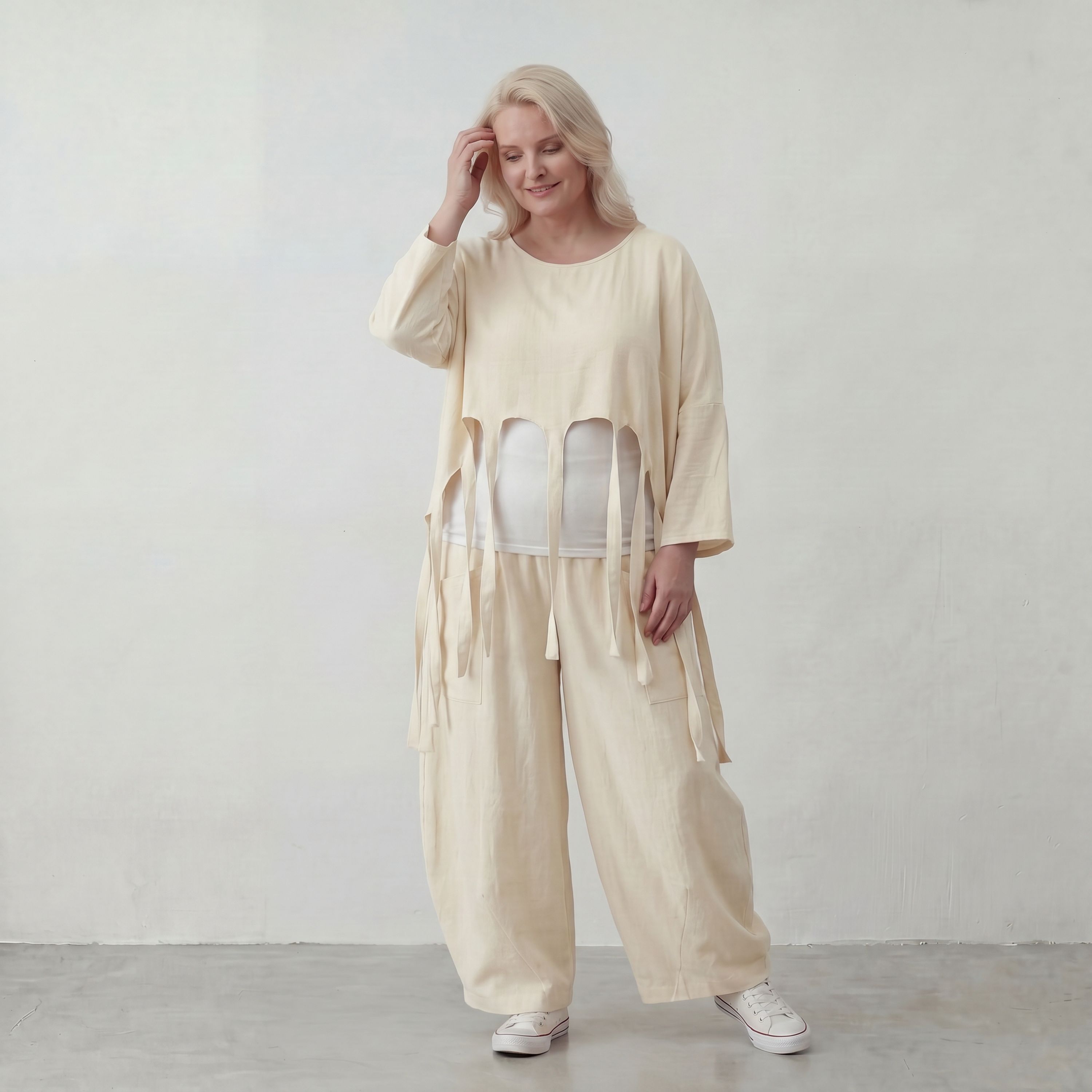 Zeitloser Oversize Lagenlook Überwurf in Creme leger luftig mit Fransen Detail fein soft