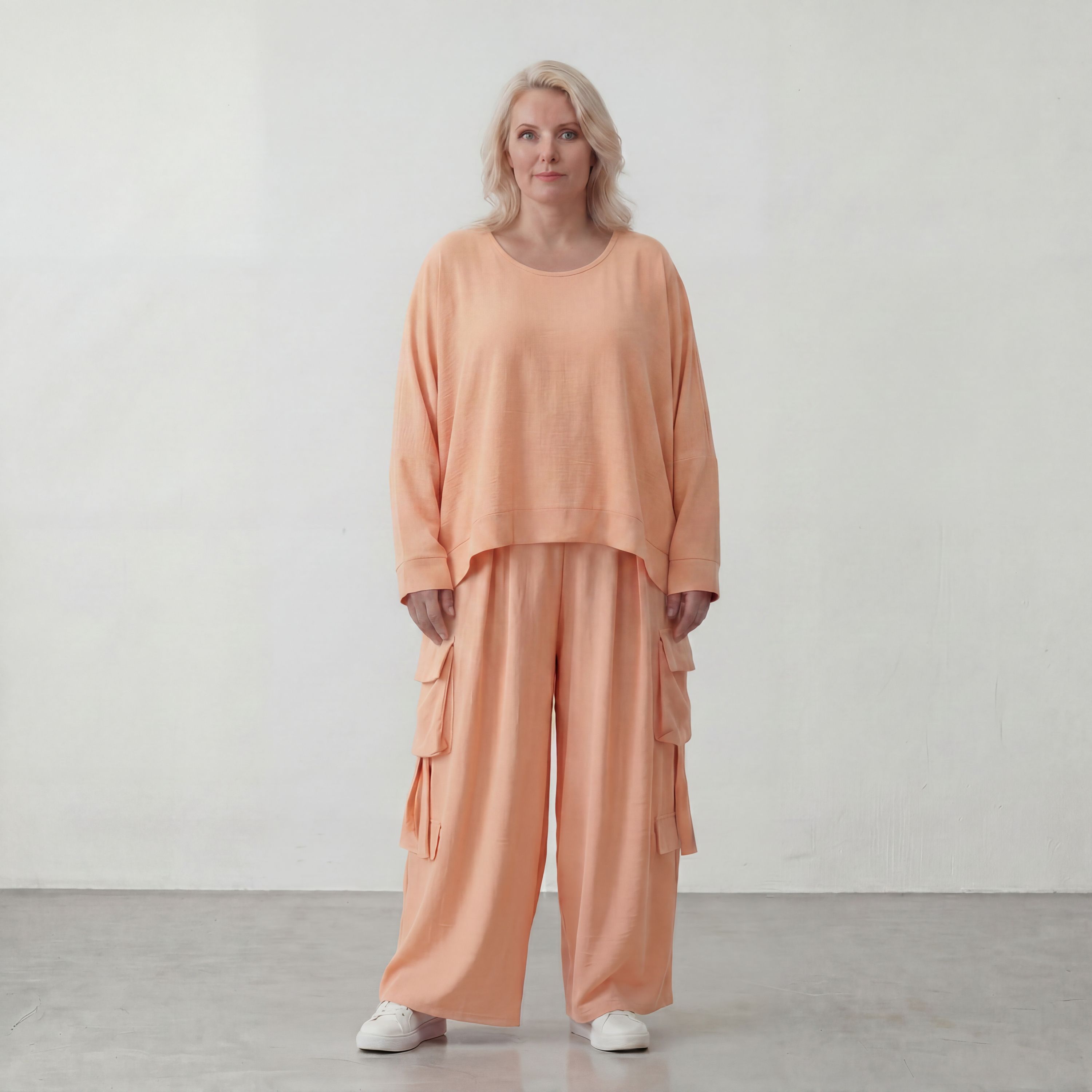 Legere Oversize Ballonhose in fliessendem Mauve mit Lagenlook und Fransen Details Trend