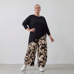 Fließende Ballonhose aus weichem Viskose Jersey in Schwarz und Ecru mit elastischem Bund