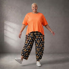 Kastiges Kurzarmshirt in leuchtendem Neonorange mit Rundhalsausschnitt und Ösenbanddetail