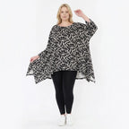 Ausgefallenes Oversize A-Form Shirt im angesagten Lagenlook mit pflegeleichtem Stretchmaterial, Schwarz/Weiß