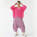Luftige Harem Hose im legeren Lagenlook mit tiefem Schritt und ausgefallenem Blockstreifen, Fuchsia/Mint